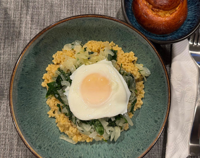 Egg over greens and onions