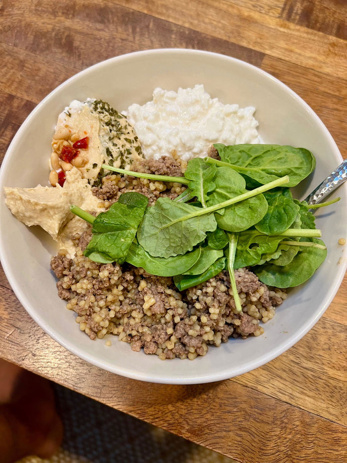 Bison, hummus and spinach bowl