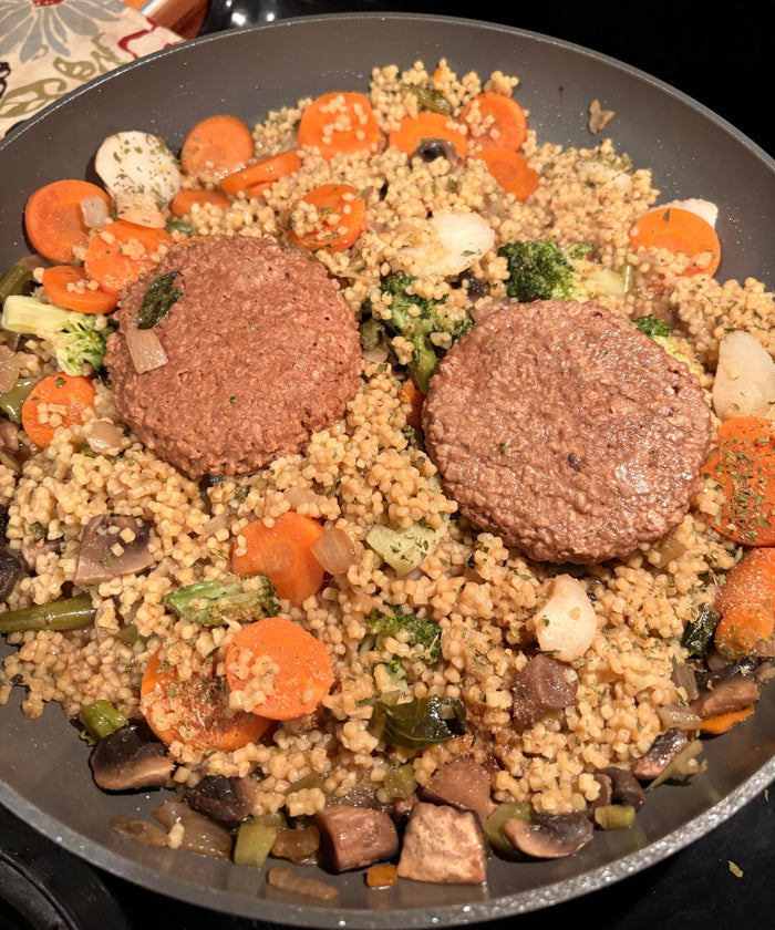 Veggie skillet with plant-based patties