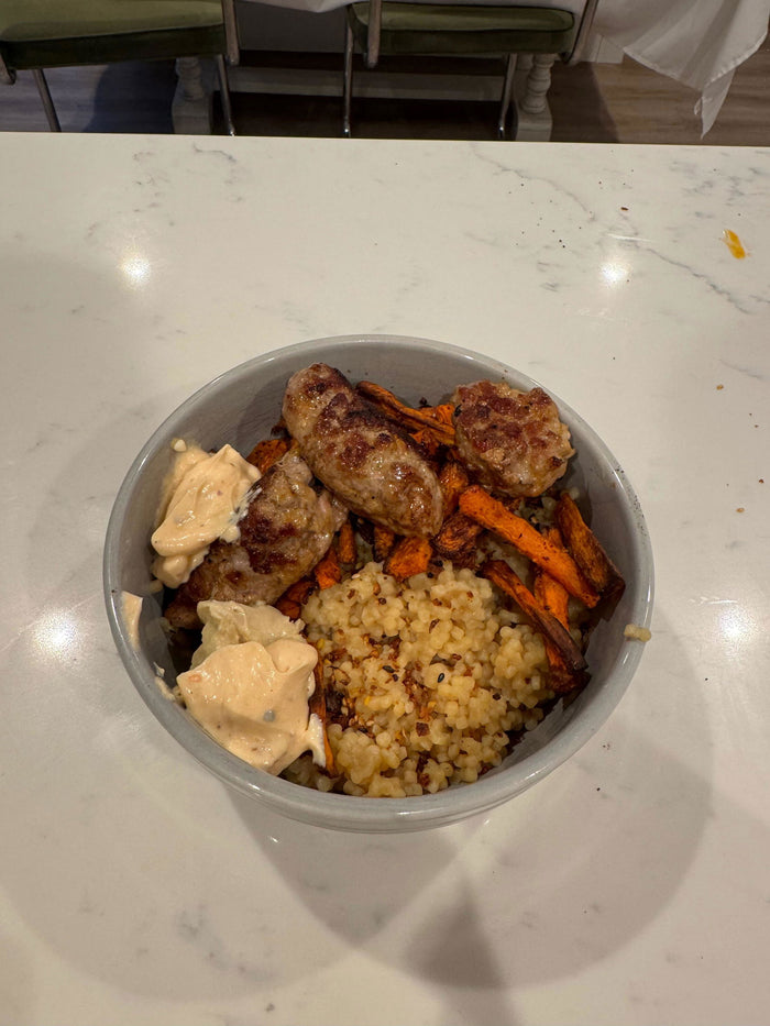Sausage and roasted carrot bowl