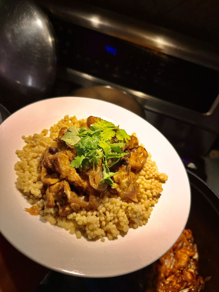 Saucy chicken with cilantro over Boostcous